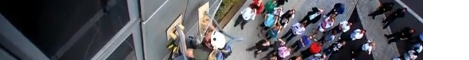 to the videos: Man climbs building with vacuum gloves